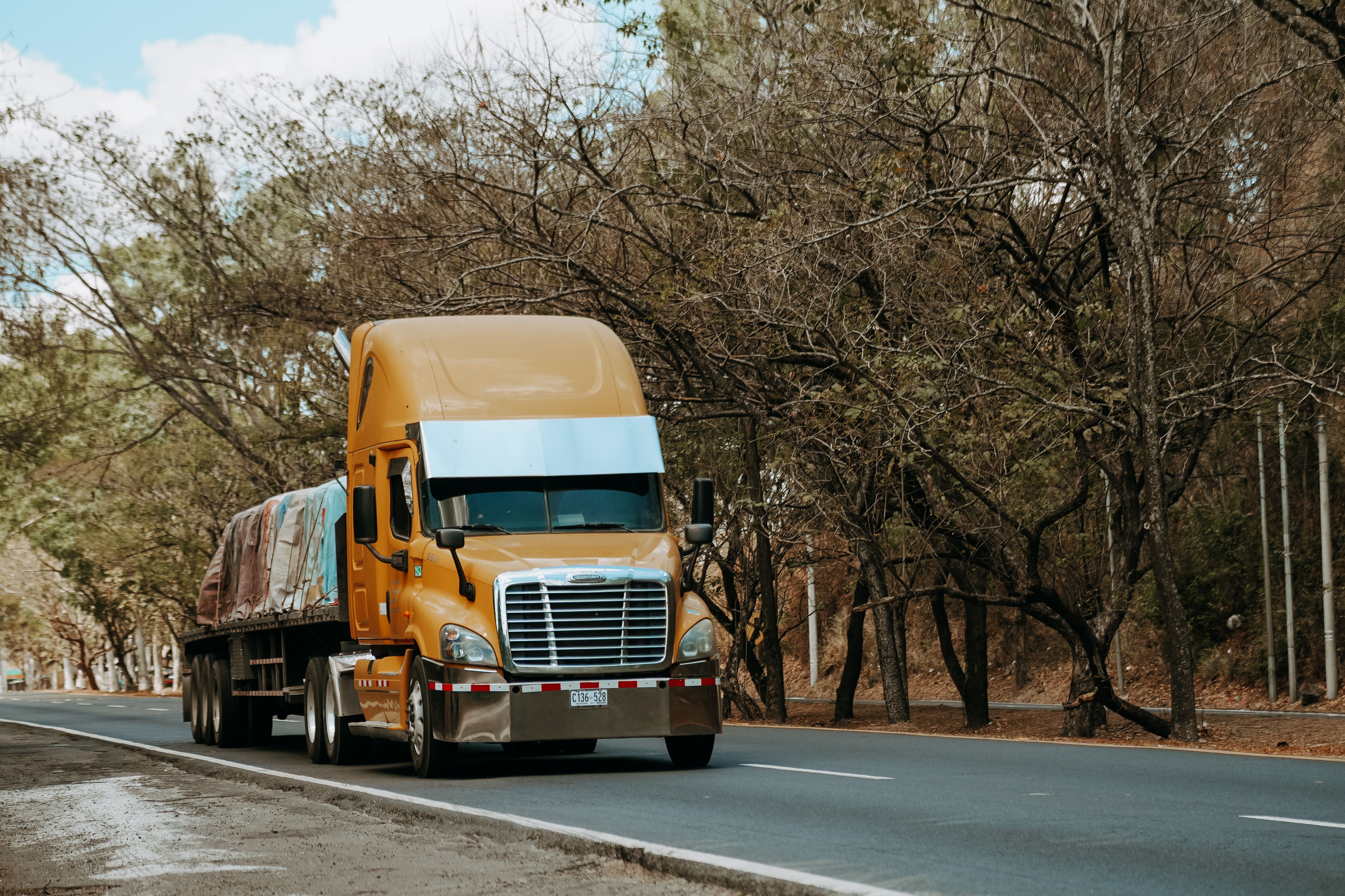 Heavy truck transporting materials on a regional route